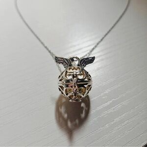Elegant Winged Sphere Necklace in Silver and Gold
